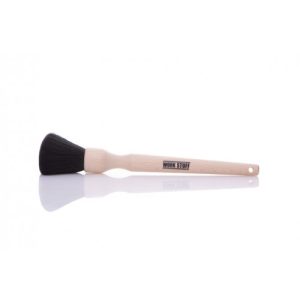 white wooden brush black